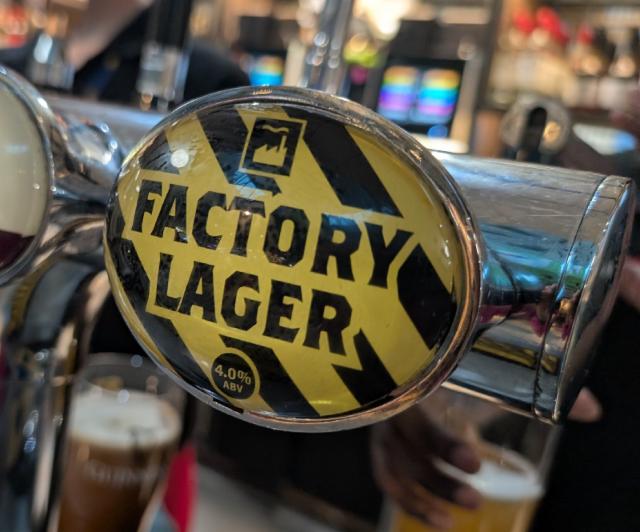 factory lager 4.0%, Manchester Brewing Co., England