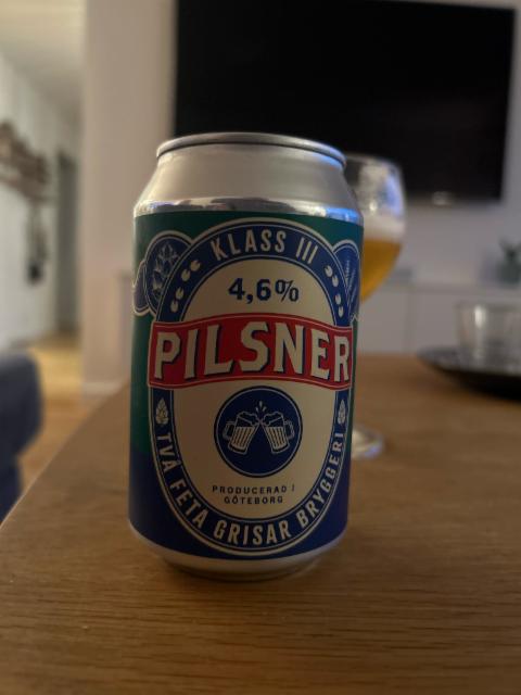 Två feta grisar pilsner, Två Feta Grisar