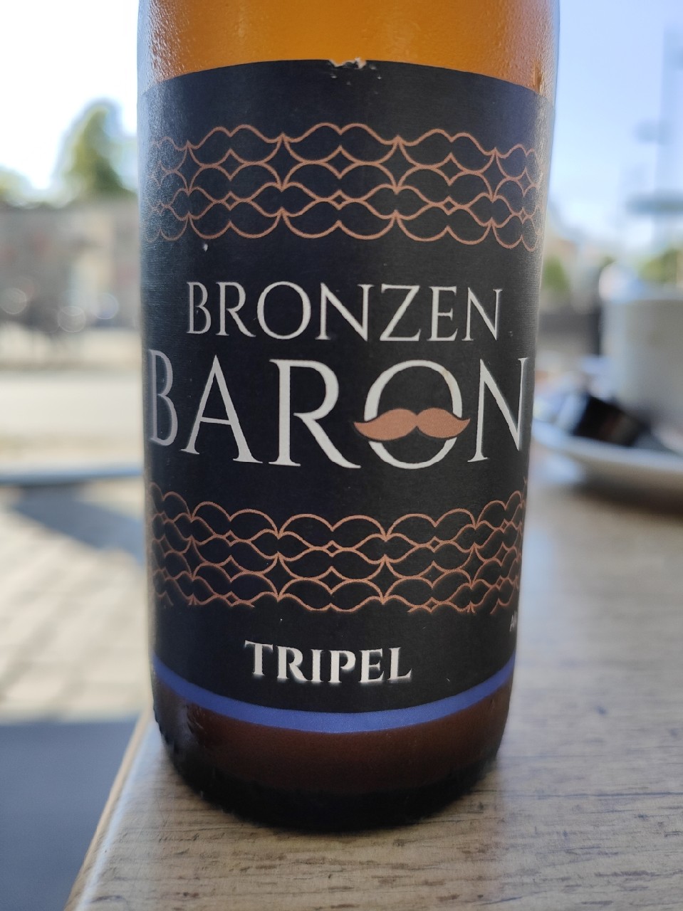 Bronzen Baron Tripel, Brouwerij De Koperen Markies