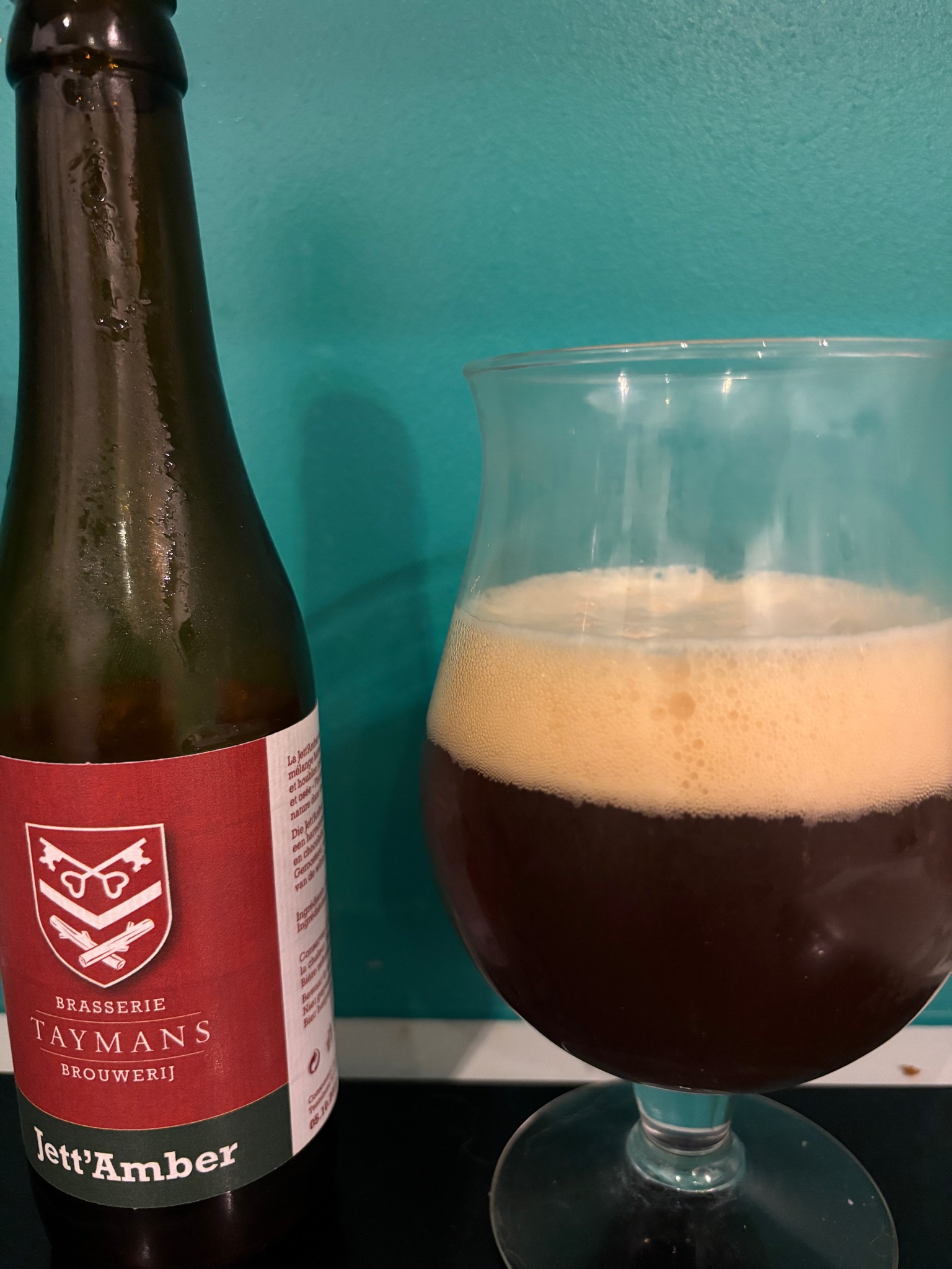 jett' amber, Brasserie Taymans Brouwerij