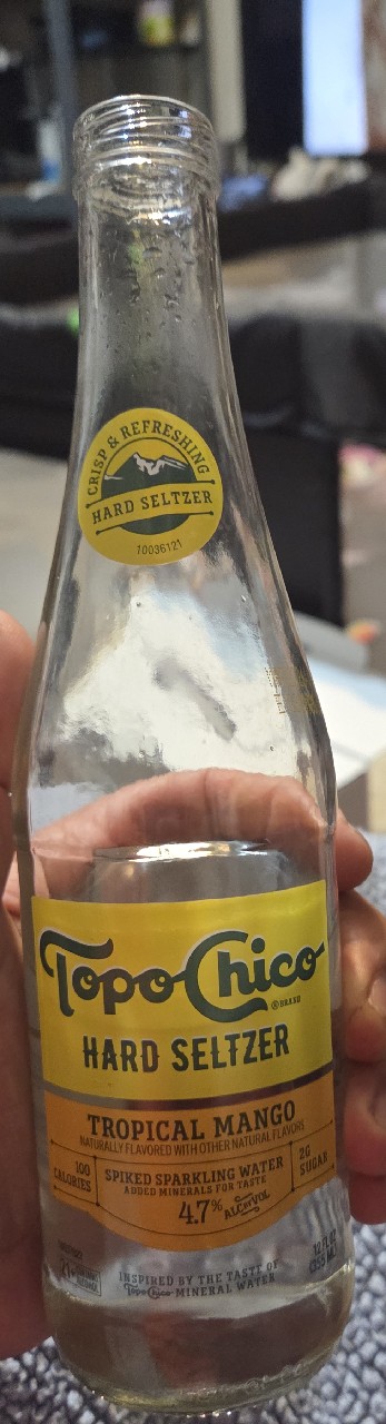 tropical mango hard seltzer, Topo Chico Hard Seltzer (Coca-Cola)